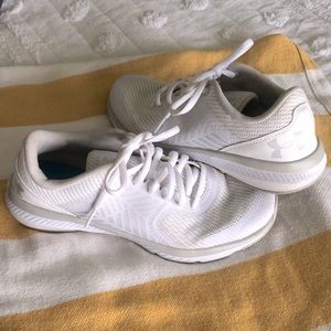 Under Armor two tone cream/white women’s training sneakers.